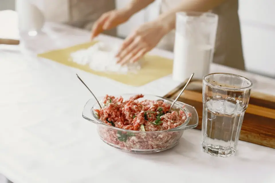 Dog owner preparing a meal