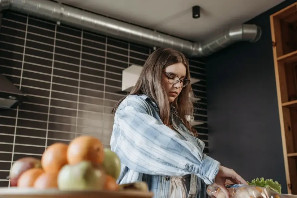 Dog owner preparing a meal